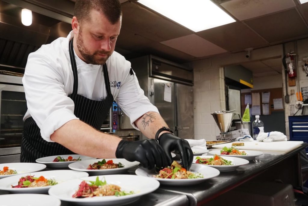 Chef Steve plating food at Bavarian Inn