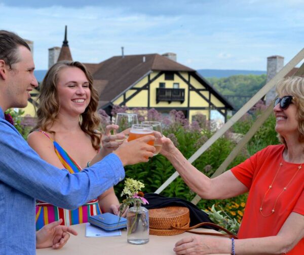 Root to Table guests toasting at the Bavarian Inn